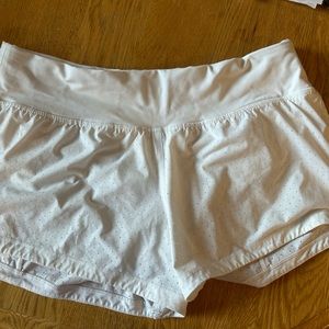 Lululemon white perforated shorts with liner